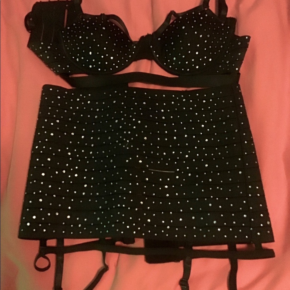 Oh La La Cheri Paris rhinestone strappy bra and garter skirt.